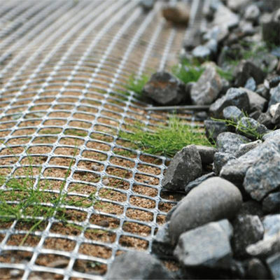 도로 토양 안정화 필수 플라스틱 PP 25.4 * 25.4mm Mesh 크기의 양축 지오 그리드